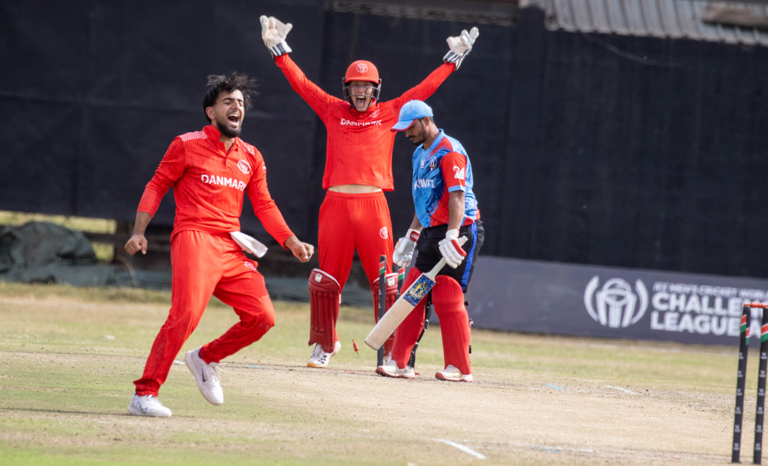 Denmark players celebrates getting a wicket against during the ICC CWC Challenge League A in Nairobi